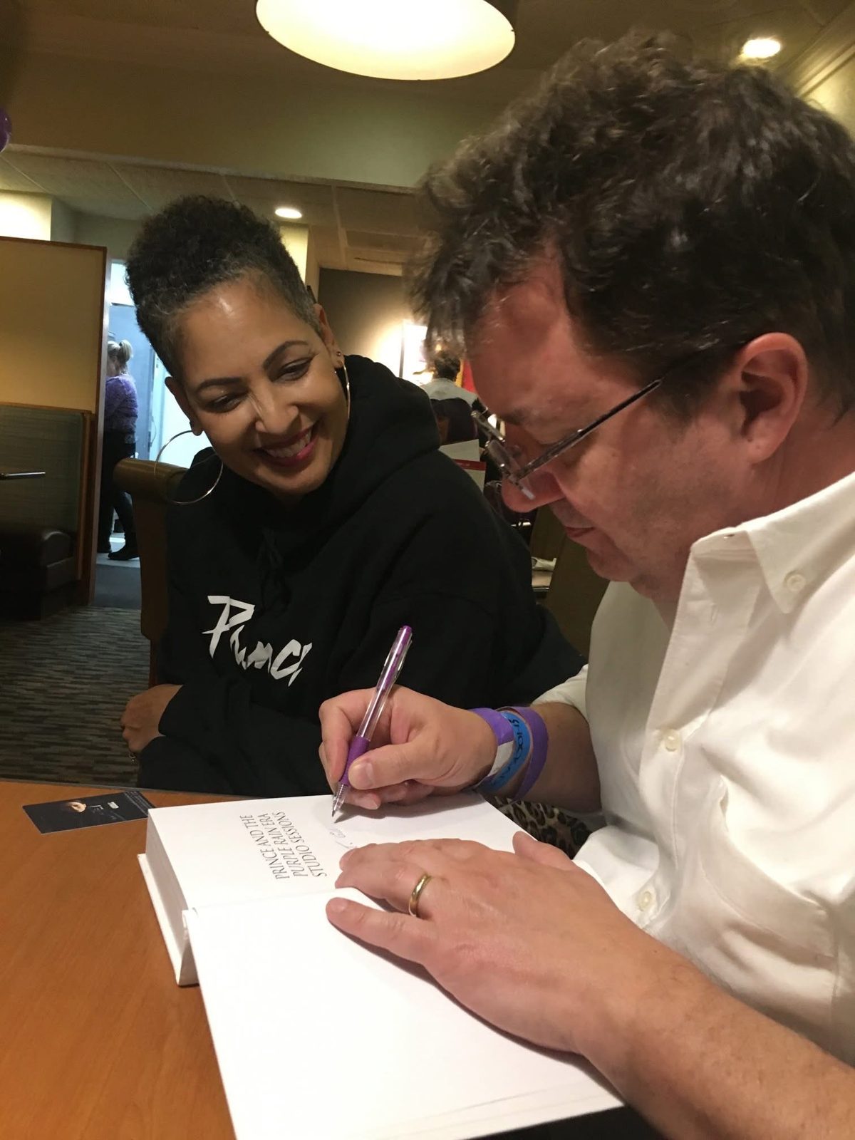 Watching a book signing
