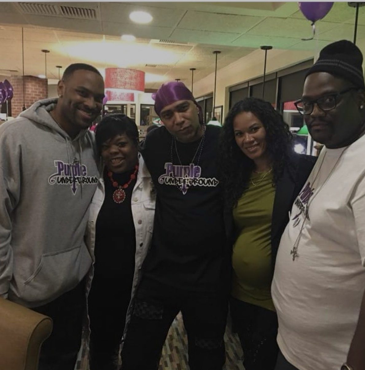 Purple Underground crew with purple balloons